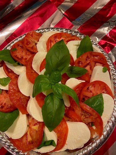 Caprese salad with fresh mozzarella, tomatoes, and basil